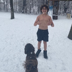 Reid Enjoying the April Snow With Hershey
