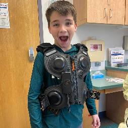 Cohen being fitted for his new Monarch vest. He has to do a vest treatment every day, twice a day for 30 minutes to clear the sticky mucous from his lungs.